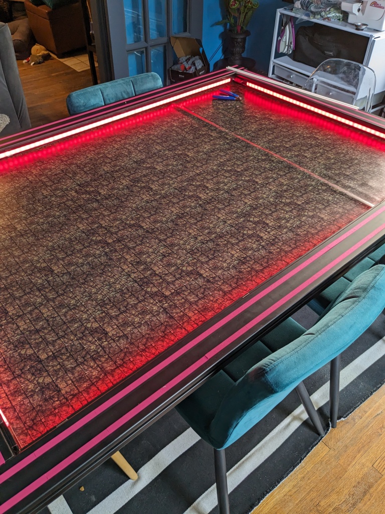 a gaming table with led lights added in